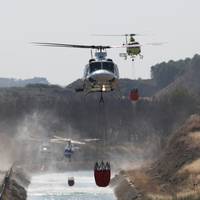 Brand ten noorden van Madrid heeft al 12.000 hectare verwoest • Franse politie pakt man op die Bois de Boulogne in Parijs in brand probeerde te steken