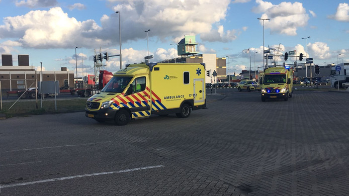 Ambulances drive onto the terrain.