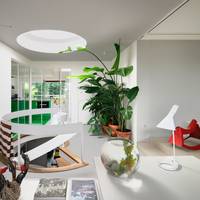 Artistieke duplex met overal groen: binnenkijken in een seventiespareltje in Deurne