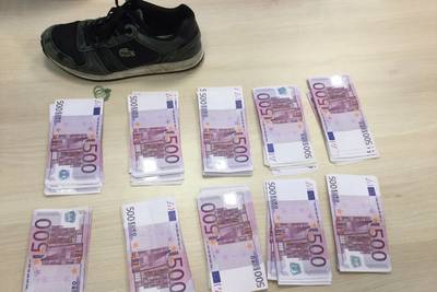 Sportschoenen vol cash: man met twee ton aangehouden