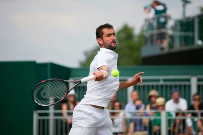 Cilic met speels gemak naar laatste acht