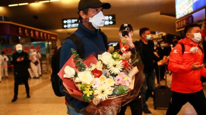 Spelers en staf van Chinese ploeg Wuhan Zall zijn na drie maanden van omzwervingen eindelijk terug in thuisstad