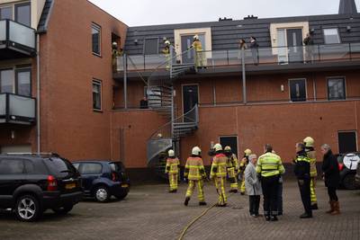 Kaars veroorzaakt brand appartement, bewoonster ongedeerd