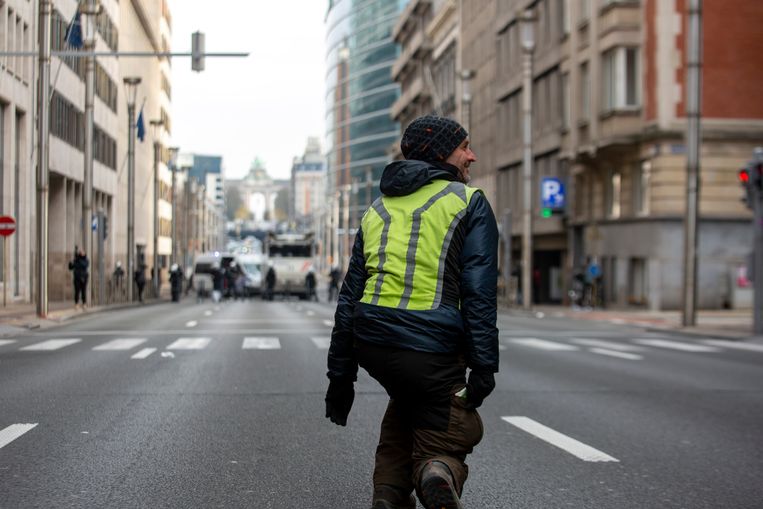 Een demonstrant in Brussel. Beeld BELGA